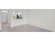 Bright, open-concept living space with tile floors at 6240 Fairmont Ln, Palmetto, FL 34221