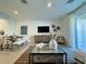 Inviting living room with modern decor, stylish furniture, and natural light at 6240 Fairmont Ln, Palmetto, FL 34221