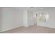 Bright and airy living room featuring neutral tile flooring and ample natural light at 6240 Fairmont Ln, Palmetto, FL 34221