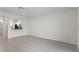 Spacious open-concept living area leading to a modern kitchen at 6240 Fairmont Ln, Palmetto, FL 34221