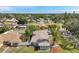 Beautiful home with mature trees, lush landscaping, and a well-maintained exterior at 6795 23Rd S St, St Petersburg, FL 33712