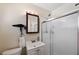Cozy bathroom featuring a glass-enclosed shower and classic fixtures, offering a clean and functional space at 6795 23Rd S St, St Petersburg, FL 33712