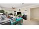 Inviting living room with terrazzo flooring, a ceiling fan, and lots of space for entertaining at 6795 23Rd S St, St Petersburg, FL 33712