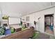 Enclosed patio space with outdoor seating, projector screen, and artificial turf at 6795 23Rd S St, St Petersburg, FL 33712