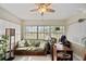 Bright sunroom featuring terrazzo flooring, neutral paint, and lots of natural light at 6795 23Rd S St, St Petersburg, FL 33712