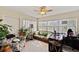 Bright sunroom featuring terrazzo flooring, neutral paint, and lots of natural light at 6795 23Rd S St, St Petersburg, FL 33712