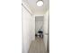 Walk in closet with additional doors and a variety of supplies at 6806 Beach Blvd, Hudson, FL 34667