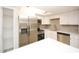 Bright kitchen with stainless steel refrigerator and new appliances at 6806 Beach Blvd, Hudson, FL 34667