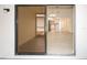 Open floorplan with sliding glass door to lanai offering plenty of natural light at 6806 Beach Blvd, Hudson, FL 34667