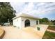 Pool house offers shade, seating, and shower area enhancing the pool experience for residents at 6806 Beach Blvd, Hudson, FL 34667