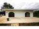 The pool house provides a convenient space for changing and showering near the community pool at 6806 Beach Blvd, Hudson, FL 34667