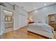Cozy bedroom with wood floors, built-in closet, and neutral color scheme at 7275 Crystal Spring Run, Weeki Wachee, FL 34607