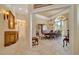 Formal dining room showcasing a large table set for a dinner party and elegant décor at 7275 Crystal Spring Run, Weeki Wachee, FL 34607