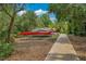 Community kayak storage area with multiple kayaks racked and ready for paddling adventures on nearby waterways at 7275 Crystal Spring Run, Weeki Wachee, FL 34607