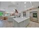 Expansive kitchen with dual islands, seating and high-end stainless steel appliances at 7275 Crystal Spring Run, Weeki Wachee, FL 34607