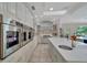 Well-appointed kitchen with stainless steel ovens and a chef's gas range at 7275 Crystal Spring Run, Weeki Wachee, FL 34607