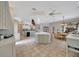 Open-concept kitchen boasts an island, modern appliances, and lots of cabinet space at 7275 Crystal Spring Run, Weeki Wachee, FL 34607