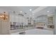 Gourmet kitchen featuring stainless steel appliances, double ovens, and ample counter space at 7275 Crystal Spring Run, Weeki Wachee, FL 34607