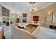 Spacious living room showcasing elegant decor, neutral color scheme, and open layout at 7275 Crystal Spring Run, Weeki Wachee, FL 34607