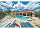 Beautiful backyard pool with lounge chairs and a jacuzzi, ideal for enjoying sunny days at 7275 Crystal Spring Run, Weeki Wachee, FL 34607