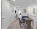 Open hallway with office nook, perfect for working from home at 8305 Crescent Oaks Dr, New Port Richey, FL 34655