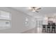 The open living area has lots of natural light and a breakfast bar perfect for entertaining at 8305 Crescent Oaks Dr, New Port Richey, FL 34655