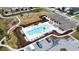 Aerial view of a community pool with sun loungers, landscaping, clubhouse, parking area, and nearby playground at 8305 Crescent Oaks Dr, New Port Richey, FL 34655