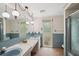 Large bathroom featuring an extended vanity and standup shower at 8340 Saint Marks Ct, Hudson, FL 34667
