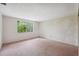 Bright bedroom with large window overlooking the backyard at 8340 Saint Marks Ct, Hudson, FL 34667