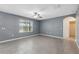 Spacious bedroom with modern ceiling fan and plenty of natural light from the window at 8938 Bower Bass Cir, Wesley Chapel, FL 33545