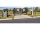 Community dog park with separate areas for small and large dogs, providing space for recreation at 8938 Bower Bass Cir, Wesley Chapel, FL 33545