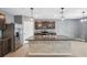 Spacious kitchen with granite countertops, stainless steel appliances, and large island at 8938 Bower Bass Cir, Wesley Chapel, FL 33545