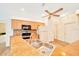Kitchen featuring wood cabinets, stainless steel appliances, double sink and granite countertops at 9130 Madrid Rd, Weeki Wachee, FL 34613