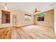 Bright living room with wood floors and lots of natural light at 9130 Madrid Rd, Weeki Wachee, FL 34613