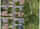 Aerial view of home displaying the neighborhood and street lined with houses at 9719 Oakwood Hills Ct, New Port Richey, FL 34655