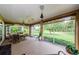 Enjoy the peaceful screened lanai with views of the beautiful green yard at 9719 Oakwood Hills Ct, New Port Richey, FL 34655
