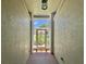 View of front door as seen from entryway at 18142 Baywood Forest Dr, Hudson, FL 34667