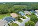 Aerial shot of a charming neighborhood with well-maintained homes, and scenic greenbelt providing a sense of community at 10097 Holly Berry Dr, Weeki Wachee, FL 34613