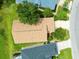 Aerial view features well-kept homes, lovely landscaping, and tree-lined streets at 10097 Holly Berry Dr, Weeki Wachee, FL 34613