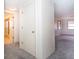 Spacious bedroom with two large windows providing natural light and a connected bathroom at 10123 Oak Hill Dr, Port Richey, FL 34668