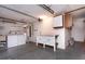 Garage with laundry and utility sink, ample storage, and access door to home at 10123 Oak Hill Dr, Port Richey, FL 34668