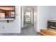 View from the hallway into a kitchen area and the front entryway at 10123 Oak Hill Dr, Port Richey, FL 34668
