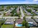 Bird's eye view of a neighborhood featuring many single-Gathering homes and a quiet street at 10224 Old Orchard Ln, Port Richey, FL 34668
