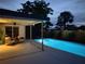 Outdoor covered patio, furniture and a private swimming pool, perfect for relaxing and entertaining under the stars at 10224 Old Orchard Ln, Port Richey, FL 34668