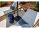 Lounging poolside with comfortable chairs, a sun umbrella, and blue accents, offering a perfect spot to unwind at 10224 Old Orchard Ln, Port Richey, FL 34668