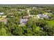 Aerial view of the property, neighborhood, and pool at 11510 Lakeview Dr, New Port Richey, FL 34654