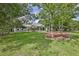 Beautiful single story home with a manicured front lawn and mature shade trees at 11510 Lakeview Dr, New Port Richey, FL 34654