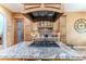 Gourmet kitchen with granite countertops, a gas cooktop island, custom cabinetry, and modern appliances at 11510 Lakeview Dr, New Port Richey, FL 34654