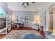 Spacious living room with an arched entry, hardwood floors, and comfortable seating arrangement at 11510 Lakeview Dr, New Port Richey, FL 34654