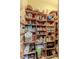 Well-stocked pantry with multiple shelves for ample storage of food and household items at 11510 Lakeview Dr, New Port Richey, FL 34654